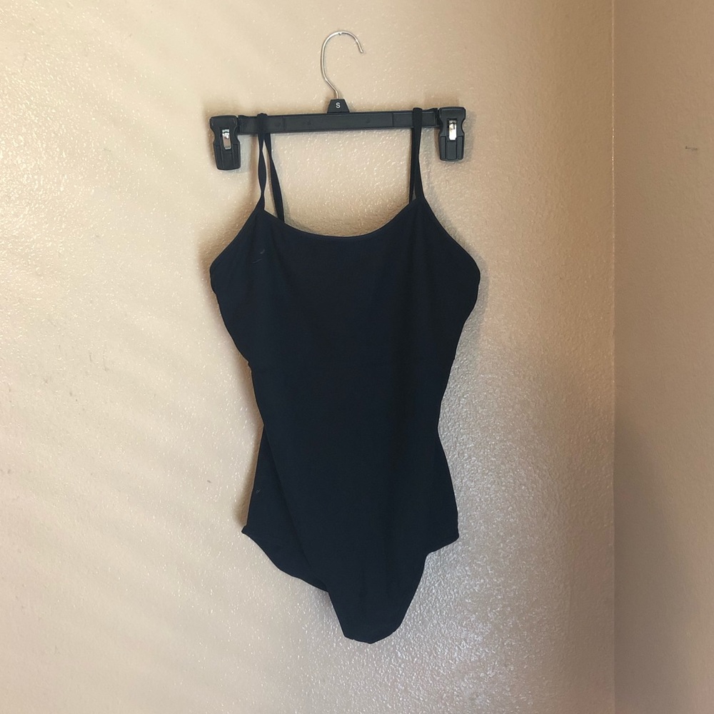 Irreversible black and plum-color dance leotard.